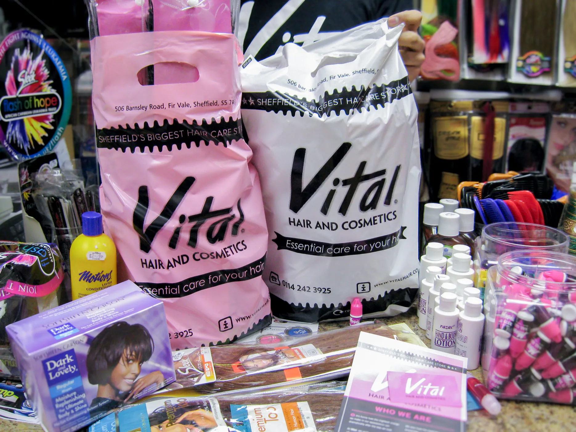 Vital hair and cosmetics bags and promotional material